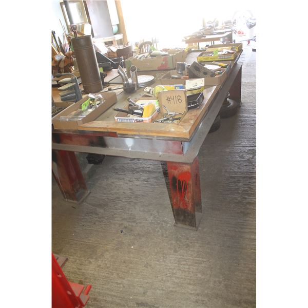 4 x 8 Heavy steel frame table c/w wood counter top (Can not be removed until 4 pm Monday June 5th)