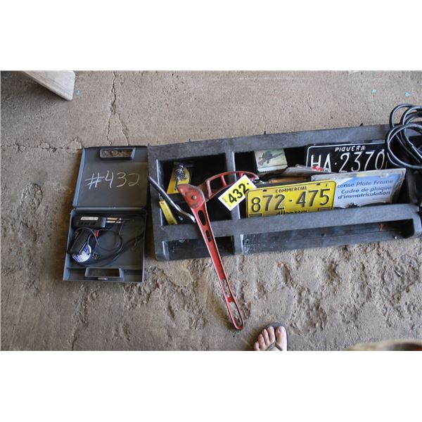 Red bending tool, soldering gun, plastic organizer, booster cables and license plates