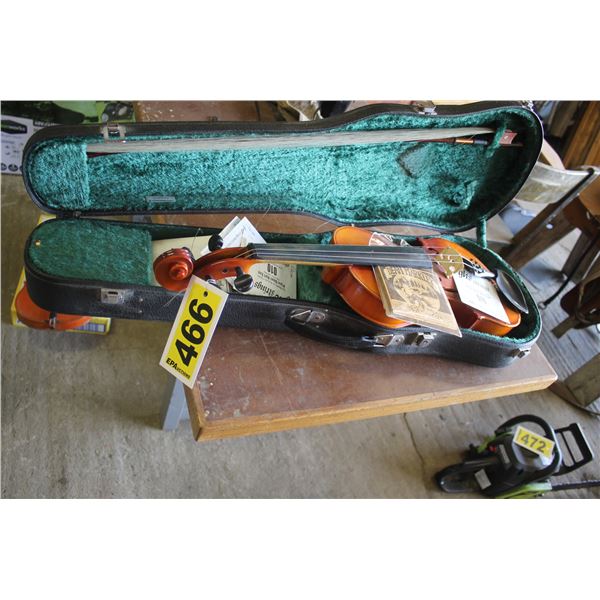 Violin in case c/w extra strings