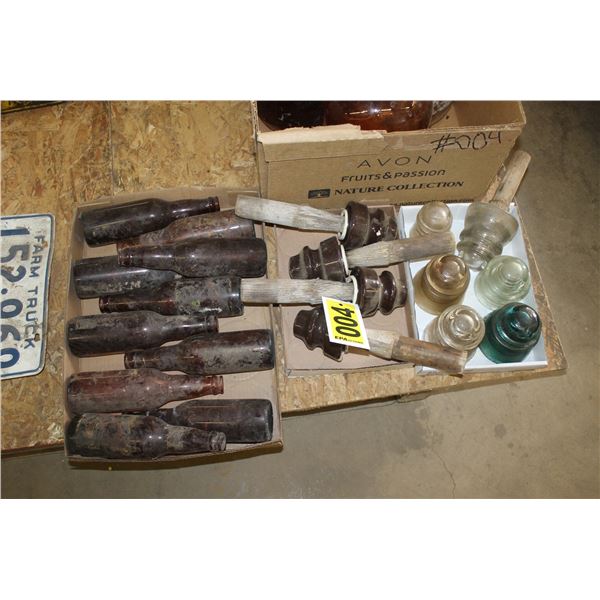 Glass gallon bottles and insulators.