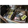Image 1 : Cassettes and a hammer.