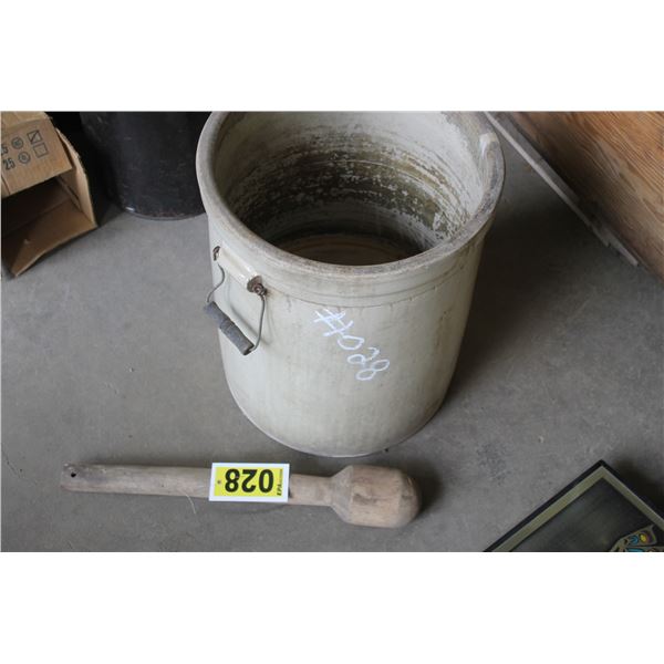 10 Gal medalta crock with hairline cracks and a wooden crusher.