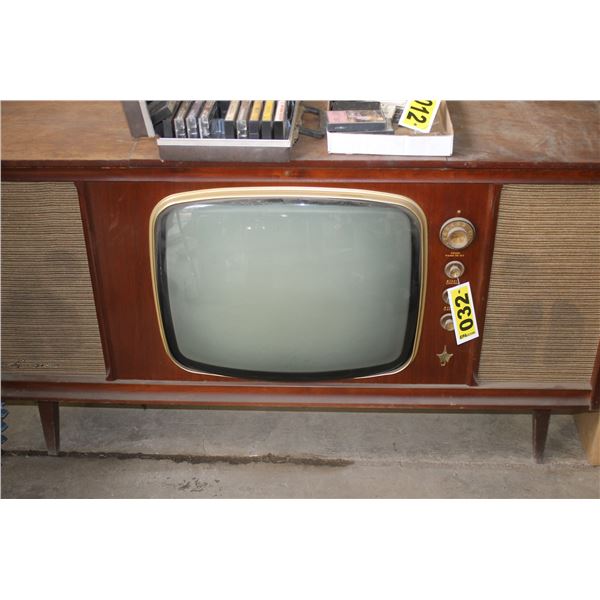 Old T.V. Cabinet with record player & AM/FM Radio.
