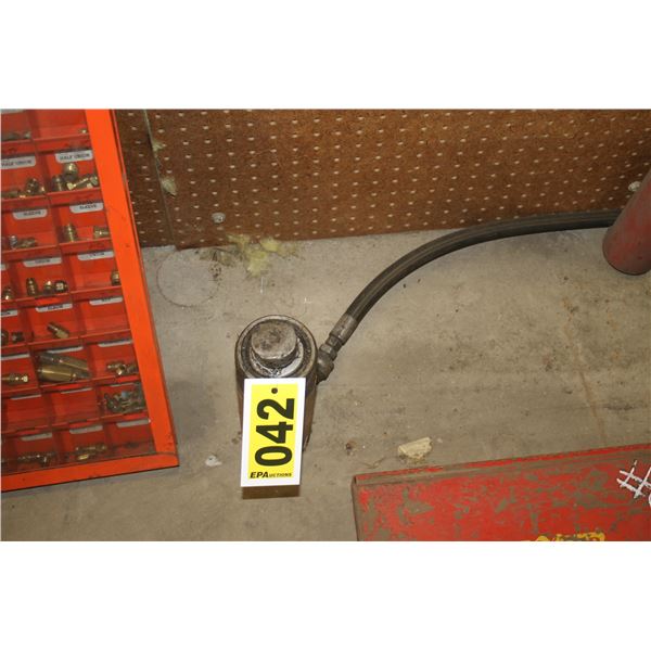 10 Ton porta power and a wrench.