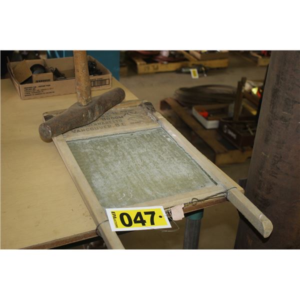 Freezer mountain wash board and a rail spike hammer.