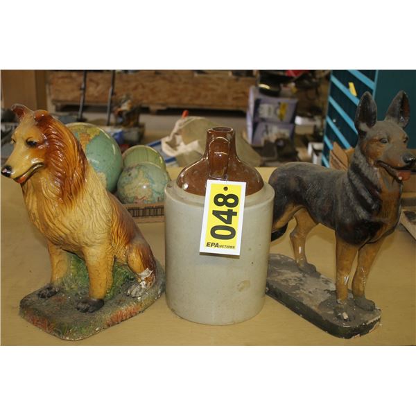 2 Ceramic dogs and a clay jug.