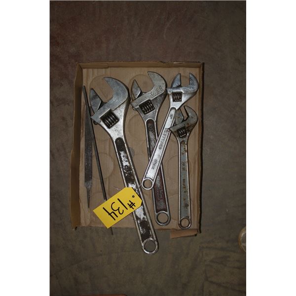 4 various size crescent wrenches and files.