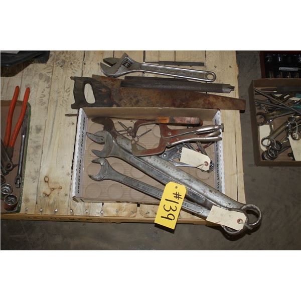 King size wrenches, couple pairs of pliers, files and saw.