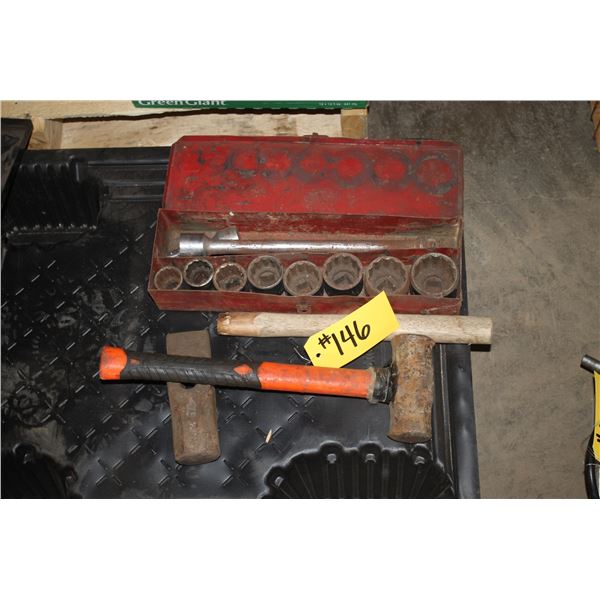 2 hammers, 3/4 inch socket drive with extension.