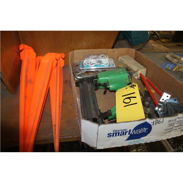 Brad nailer, tent pegs, tin snips, presto pins and machine bolts.
