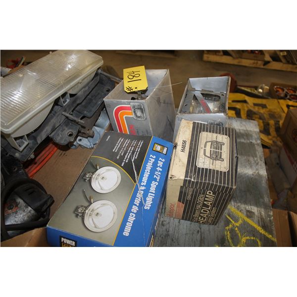 Misc. Headlights, brake pot, horns, trailer plug-ins, clearance lights, and a wood table.