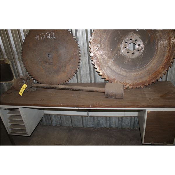 (2) Saw blades 27" & 32", man drill and 3'x6' metal desk.