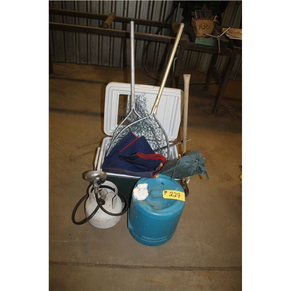 Cooler, air mattress, water jug, tent, 5lb propane bottle with burner and wood handled axe.