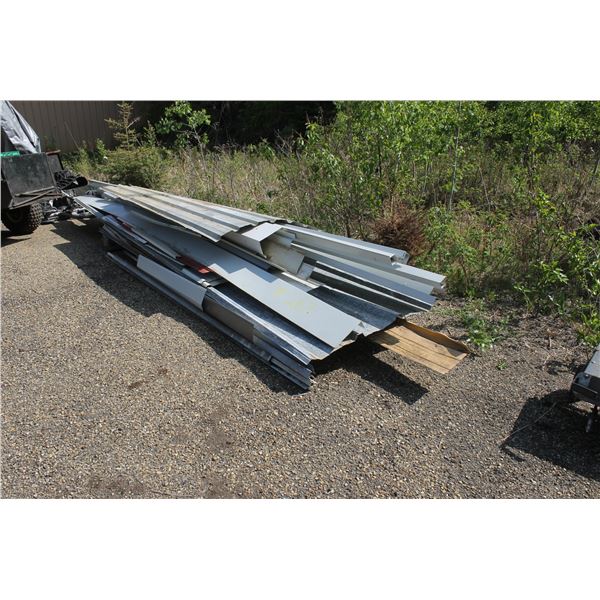 Metal sheeting and pieces and a lawn aerator.