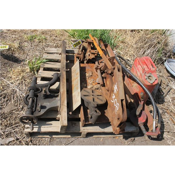 Metal sheer, post drill parts, gas pump and metal jerry can.