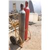 Image 1 : (2) Oxygen bottles and bottle cart. (Sold AS IS)