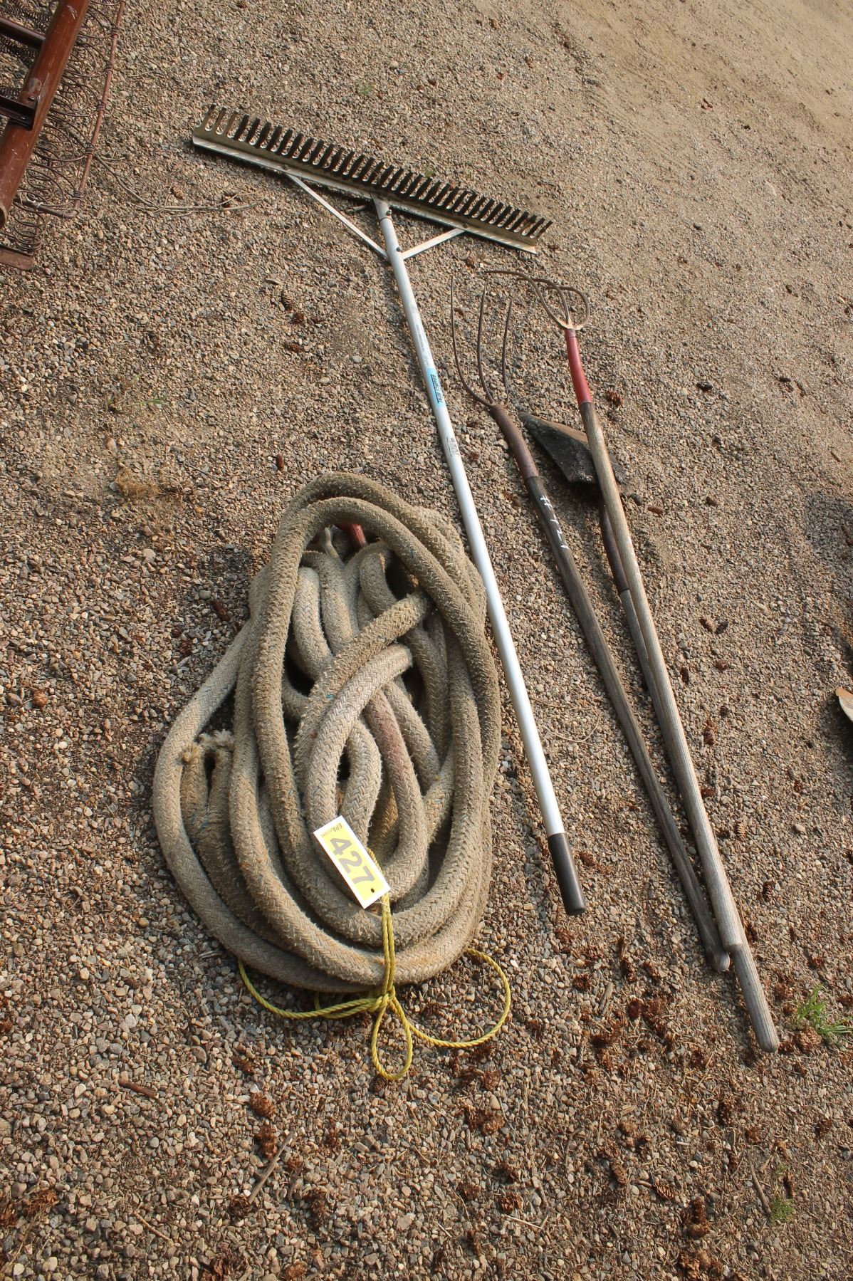 1 1/2 inch diameter tow rope, landscaping rake, two forks and a shovel.