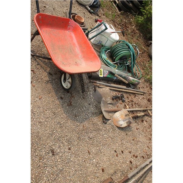 (3) Shovels, 1 garden rake, garden hose/reel, landscape fabric, sprinklers, hatchet and a wheelbarro