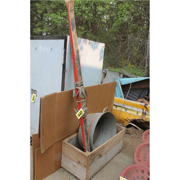 Wood box, metal tub and skis.