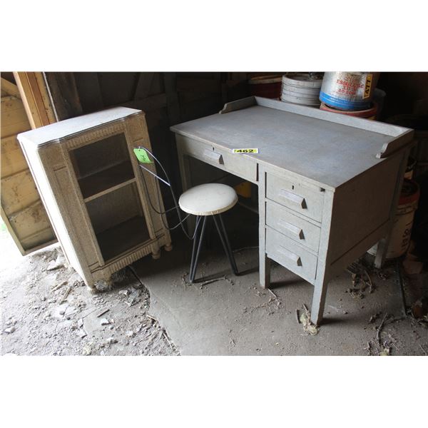 Desk, chair and cabinet.