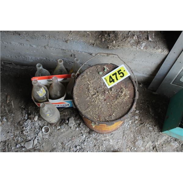 White rose cans, happy pop bottles.