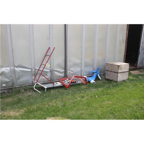 Wooden box and outdoor kids toys.