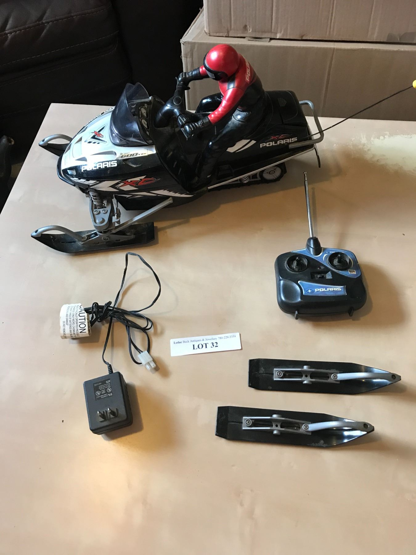 Polaris Remote Control Snowmobile Beck Auctions Inc.