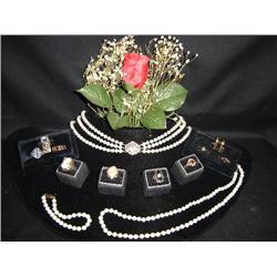 Triple strand of pearls 1 carat diamonds