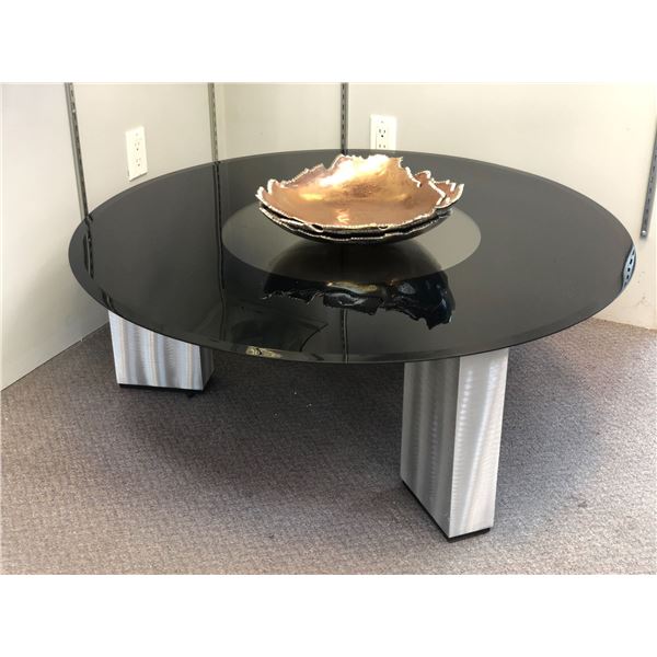 Black glass top round coffee table w/ decorative metal centerpiece - approx. 42in diameter x 15in ta