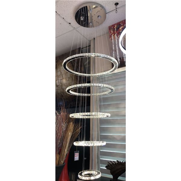 Contemporary 5 ring chandelier (bidder is responsible for removal)