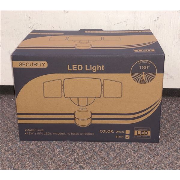 New motion-activated security LED light (New in box)