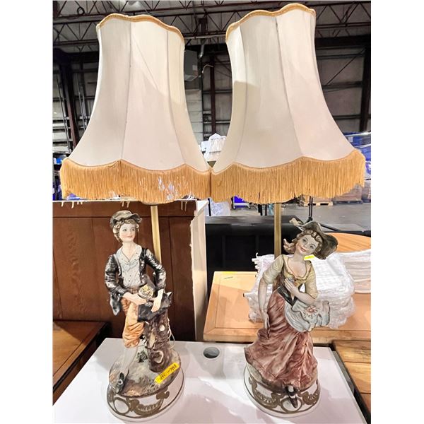 Pair of porcelain figural table lamps (50in H)