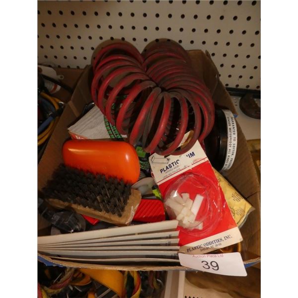 hose, brush, plastic shim, bungee cords, spark