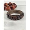 Image 2 : 2 Carved Wooded Bracelets (Interesting)