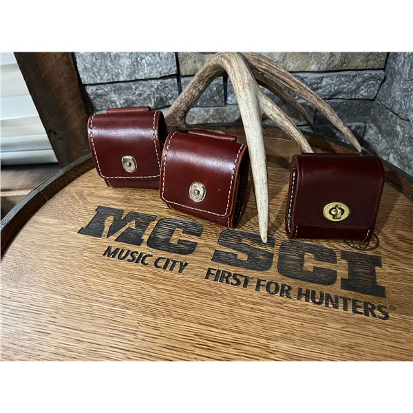 3  Deluxe Cartridge Carriers (2) 30-06 size (M) & (1) .22 LR holders Donated By: Triple K Brand