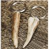 Image 1 : Love stone, carved coin pendants, whitetail antler keychains, animal print travel jewelry box