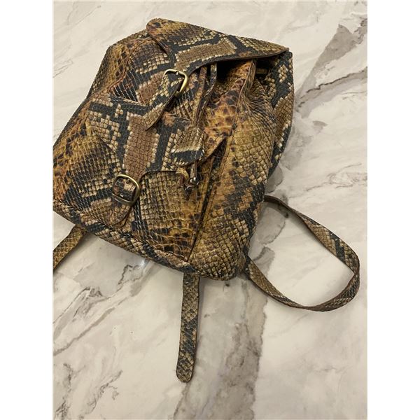 Snake purse backpack