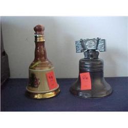 2 figural bottles