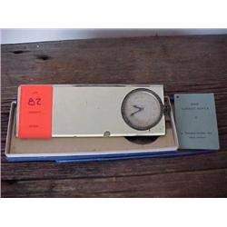 Sandoz watch in mirror