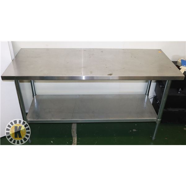 STAINLESS STEEL TABLE. TOP IS 60"X24"