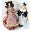 Image 1 : 2 PORCELAIN DOLLS ON STANDS - ONE W/BASKET OF FLOWERS