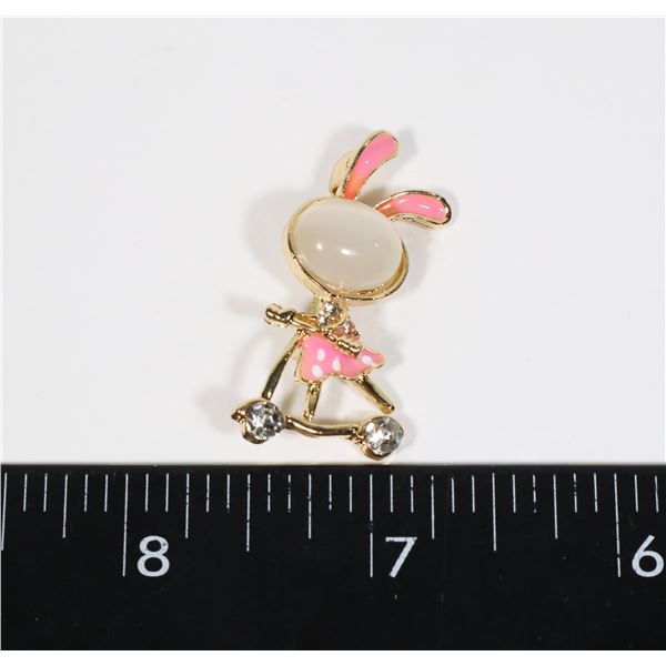 NEW PINK SKIRT BUNNY ON SCOOTER