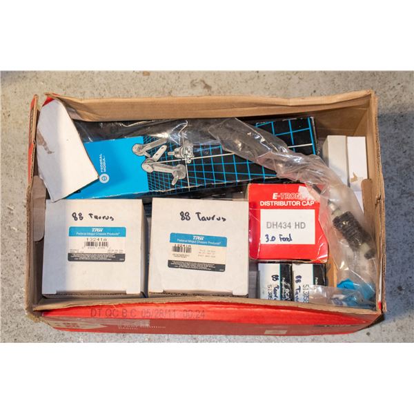 BOX OF 88 FORD TAURUS NEW PARTS,