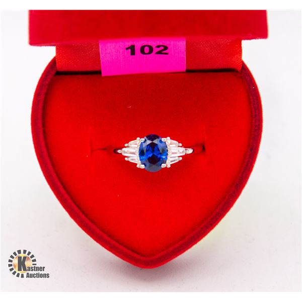 LADIES SAPPHIRE COLORED CENTER WITH BAGUETTE CZ