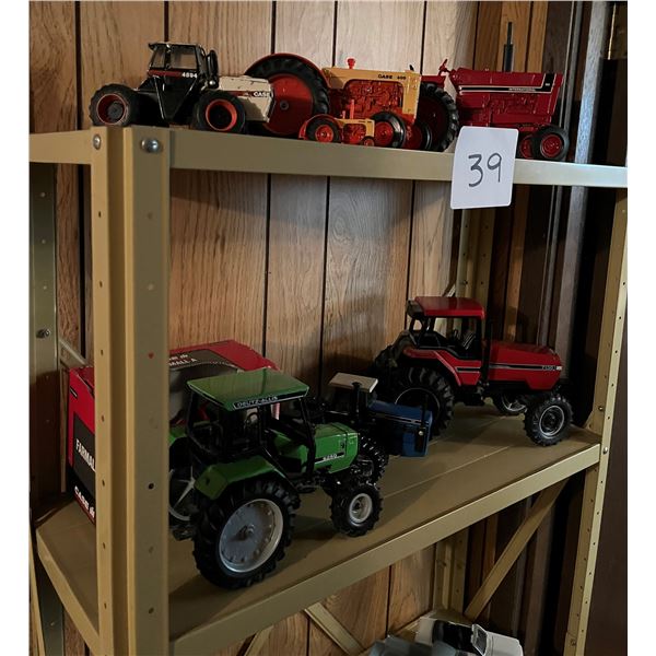 Top 2 shelves of tractors