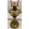 Image 6 : "Flying Fish" Oil lamp in Olive Green and clear glass chimney.