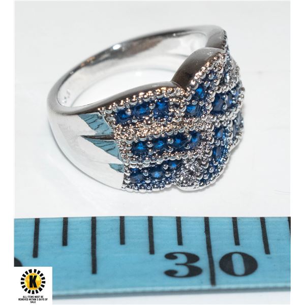 LADIES DINNER RING WITH BLUE SAPPHIRE COLORED