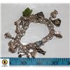 Image 1 : STERLING SILVER CHARM BRACELET WITH MANY