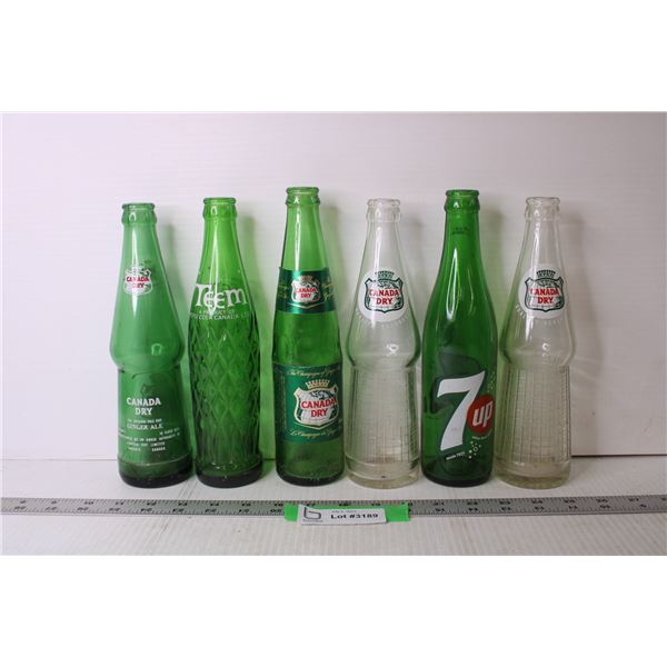 Assorted Glass Bottles - 7 Up and Canada Dry