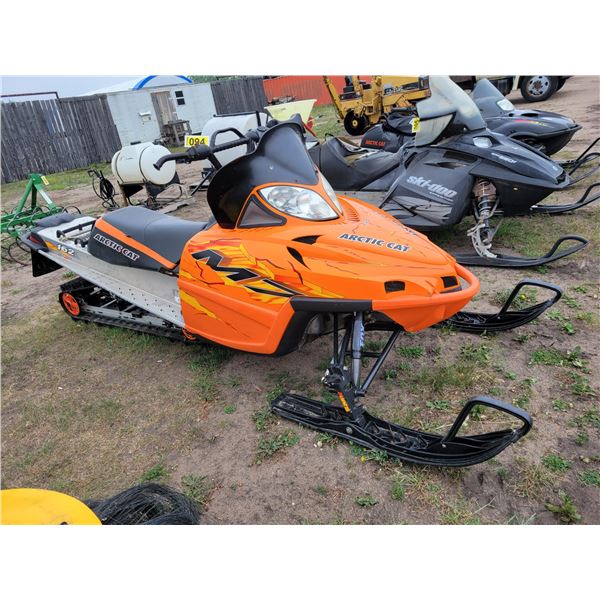 2006 Orange Arctic Cat EFI M7, elec. Start, 165 hrs c/w cover. Good running condition, SN.4UF06SNN36